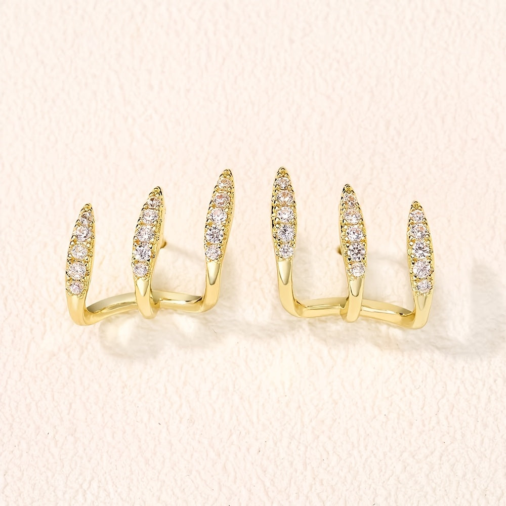 Elegante Ohrringe mit drei Klauen aus Strass