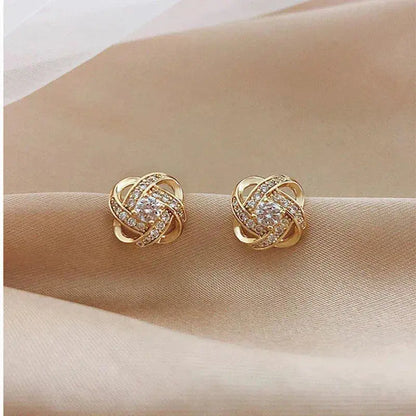 Goldene Spiralblumen-Kristall-Ohrringe