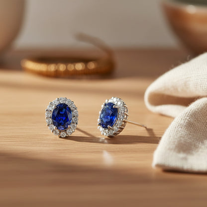 Boucles d'oreilles puces ovales en saphir blanc