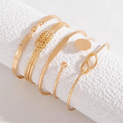 Elegantes, geknotetes Goldarmband-Set