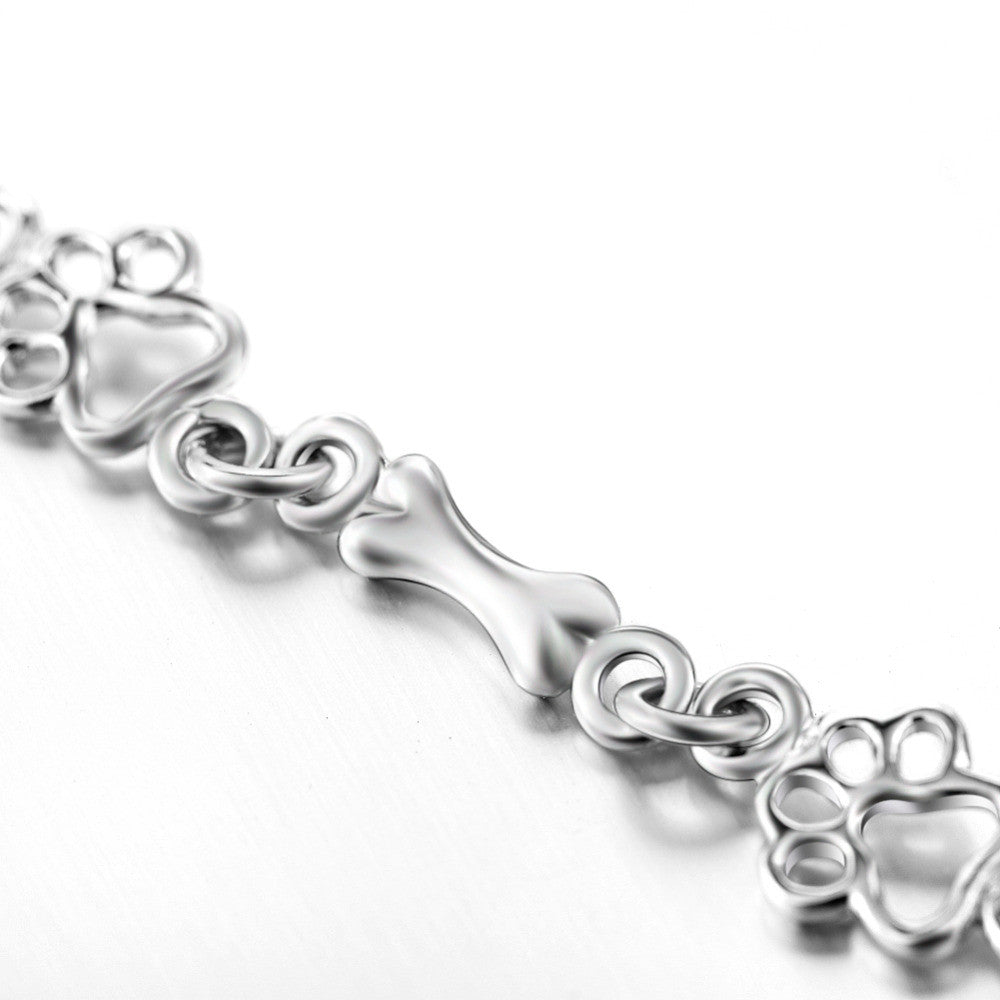 Limitierte Edition: Armband mit reinem Silber und Hundepfoten- und Knochen-Anhängern