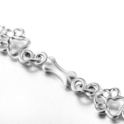 Limitierte Edition: Armband mit reinem Silber und Hundepfoten- und Knochen-Anhängern