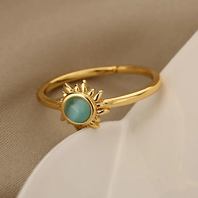 Opalstein Sonnenringe in Gold und Silber