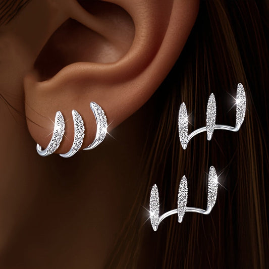 Elegante Ohrringe mit drei Klauen aus Strass
