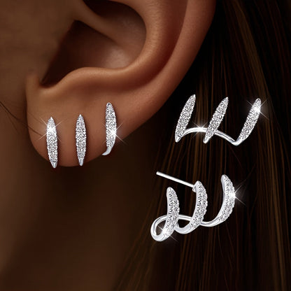 Elegante Ohrringe mit drei Klauen aus Strass